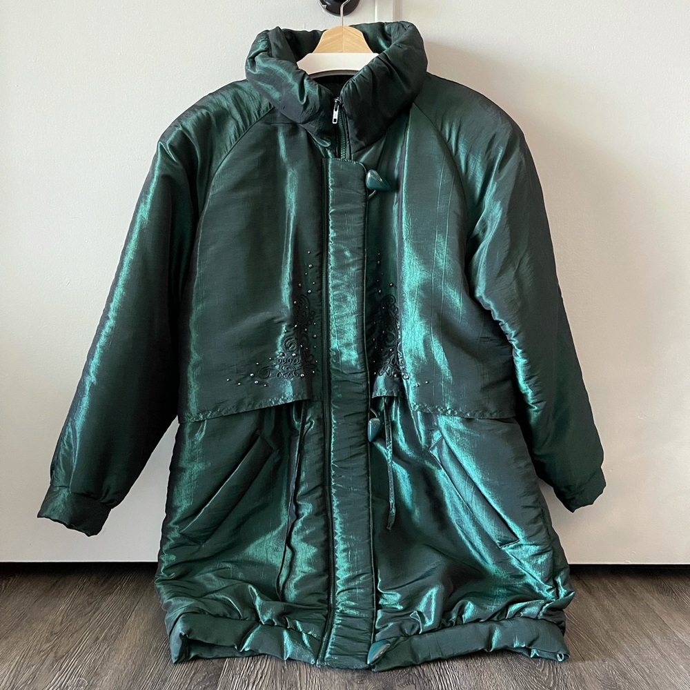 80s/90s puffy iridescent green coat.